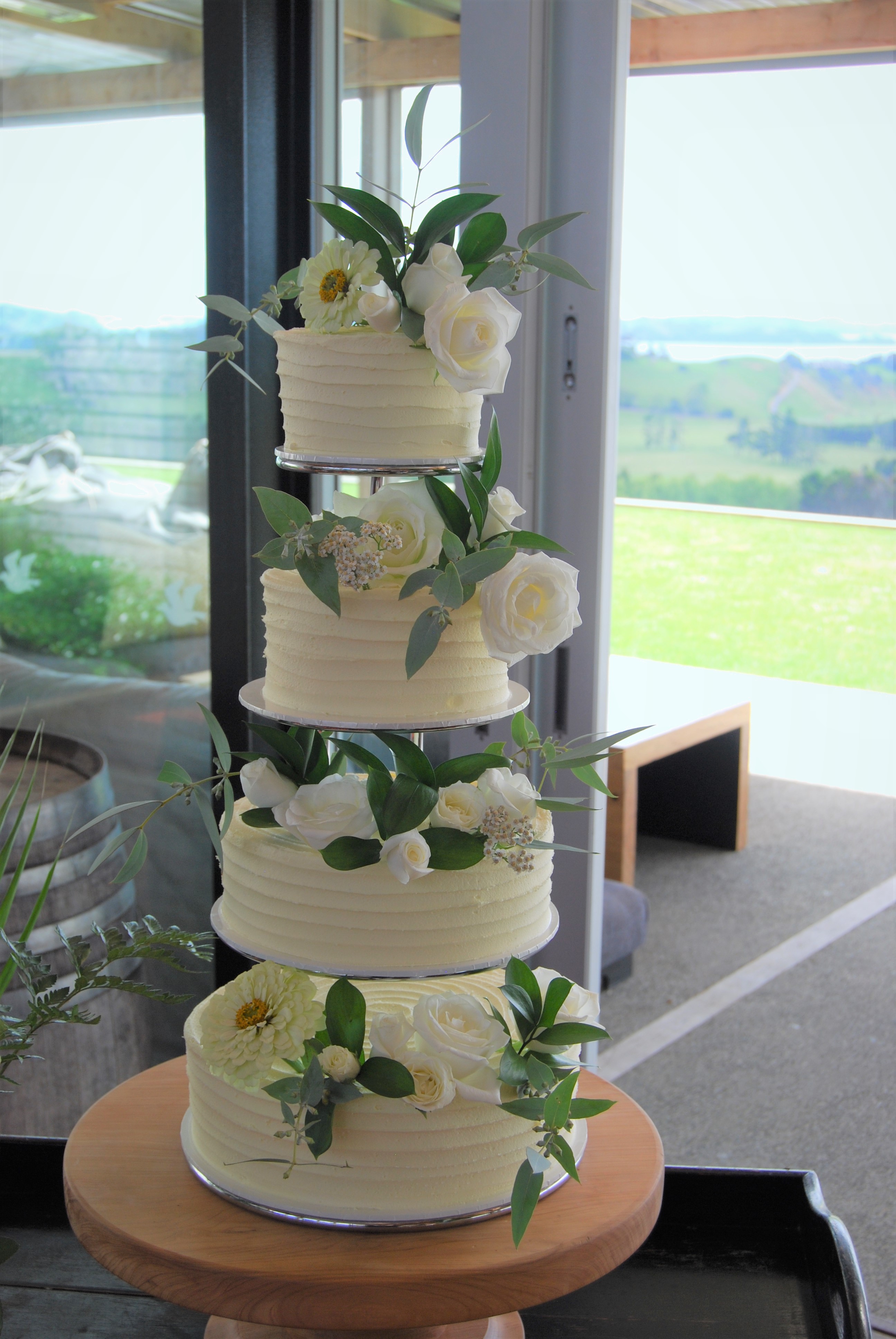 4 Tier Wedding Cake $595 (flowers not included) • Temptation Cakes