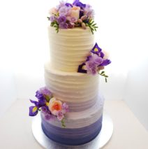 Purple Ombre Wedding Cake with flowers $650