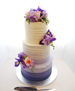 Purple Ombre Wedding Cake with flowers $650